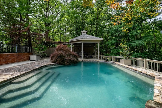 view of swimming pool with a gazebo