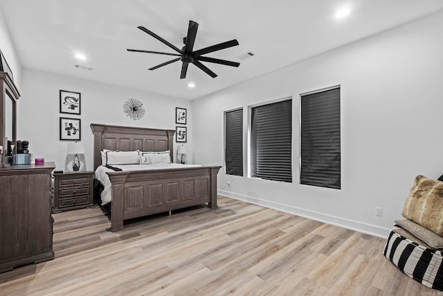 bedroom featuring ceiling fan and light wood-type flooring