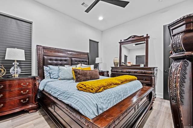 bedroom featuring ceiling fan and light wood-type flooring