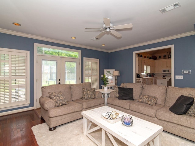 living room with ceiling fan, french doors, sink, crown molding, and hardwood / wood-style flooring