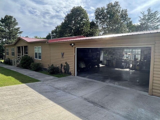 view of side of home with a garage