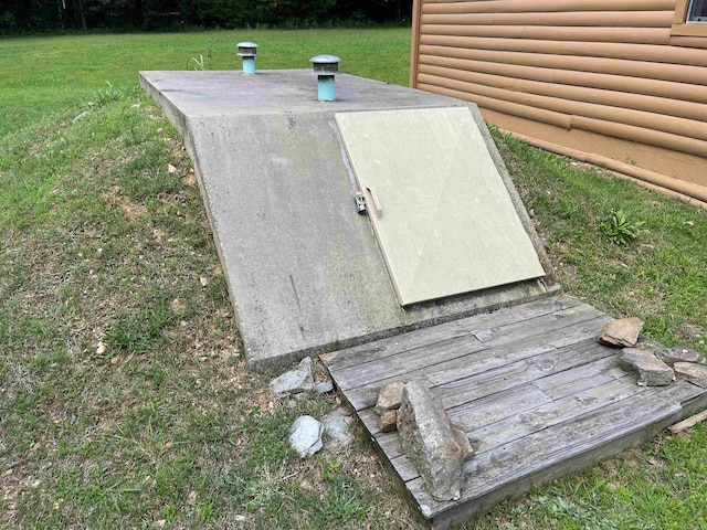 entry to storm shelter with a lawn