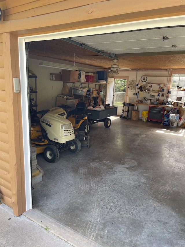 garage with a workshop area