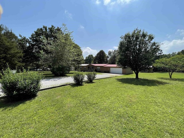 view of side of home with a garage