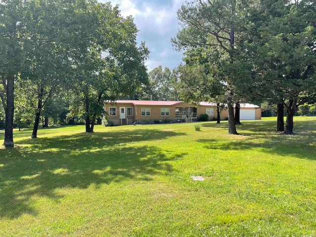 view of yard featuring a garage