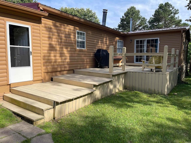 deck featuring a yard