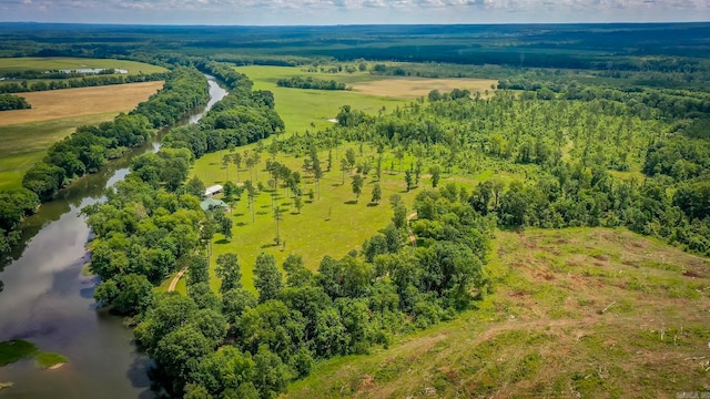 birds eye view of property with a rural view and a water view