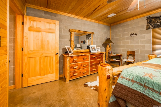 bedroom featuring ceiling fan, wooden ceiling, and concrete flooring