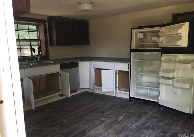 kitchen with dark hardwood / wood-style flooring, a textured ceiling, sink, dishwasher, and white cabinetry