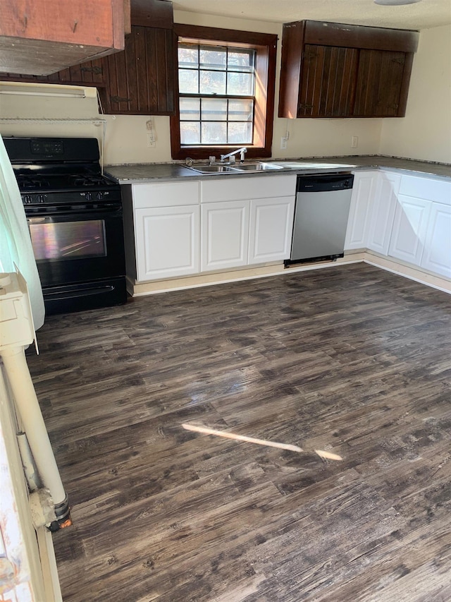 kitchen with stainless steel dishwasher, black range with gas cooktop, sink, white cabinets, and dark hardwood / wood-style floors