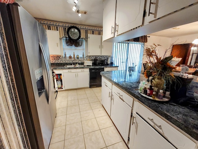 kitchen featuring white cabinetry, dishwasher, backsplash, stainless steel fridge, and light tile patterned floors