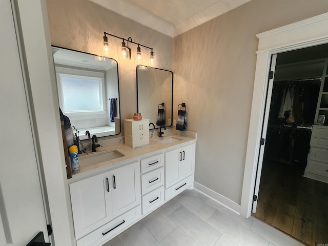 bathroom featuring tile patterned floors and vanity