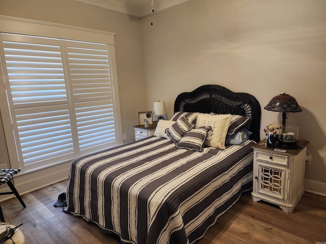 bedroom featuring dark wood-type flooring