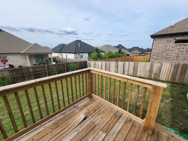 deck featuring a yard