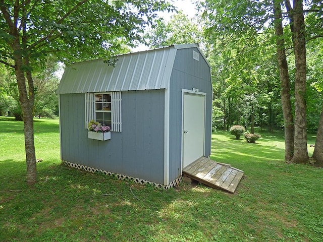 view of shed / structure featuring a yard