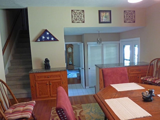 dining area with light tile floors