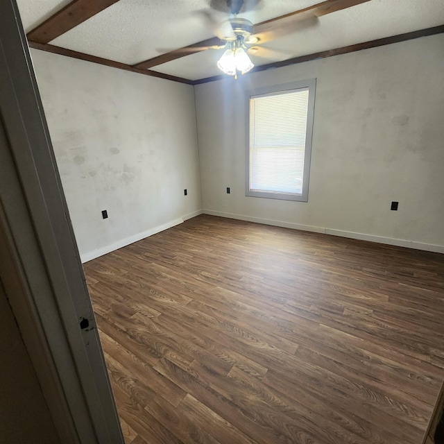 1947 63rd Hwy, Hardy, AR 72542 - unfurnished room featuring ornamental molding, baseboards, a textured ceiling, dark wood finished floors, and a ceiling fan