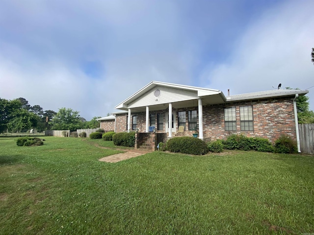 view of front of home with a front yard