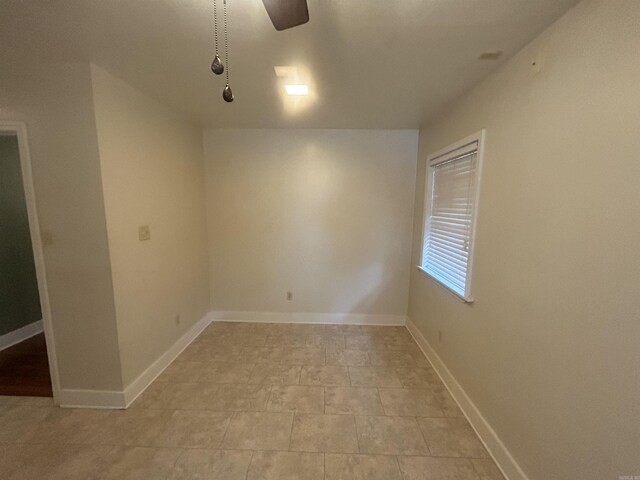 spare room featuring ceiling fan, dark hardwood / wood-style floors, and ornamental molding