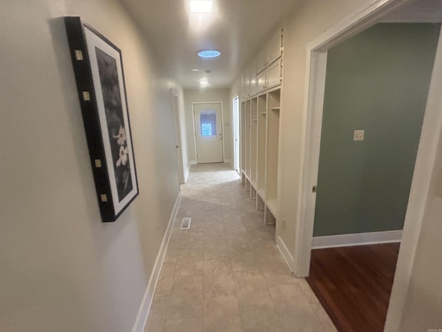 corridor with baseboards