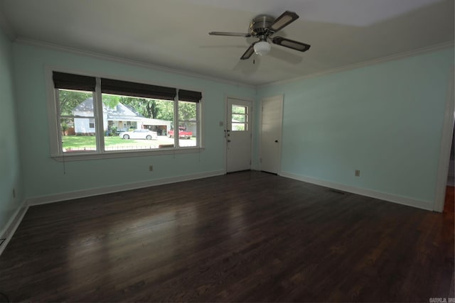 interior space featuring crown molding, ceiling fan, and dark wood-type flooring