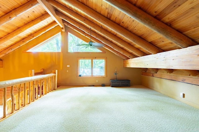 bonus room featuring vaulted ceiling with beams, carpet floors, ceiling fan, and wooden ceiling