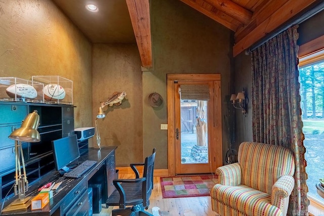 office featuring light hardwood / wood-style floors and vaulted ceiling