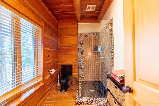 bathroom featuring wooden walls, plenty of natural light, and wood ceiling