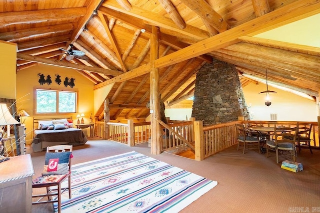 carpeted bedroom with beamed ceiling, high vaulted ceiling, and wood ceiling