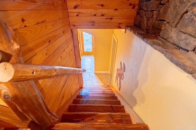 stairway with hardwood / wood-style floors