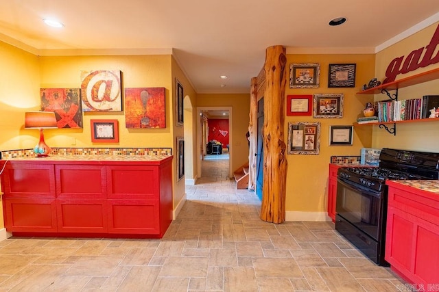 kitchen featuring black gas range oven