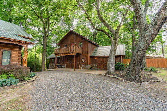 view of front of house with a deck