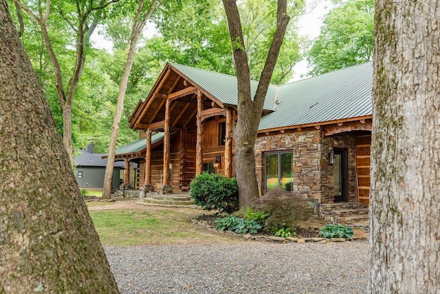 view of log cabin