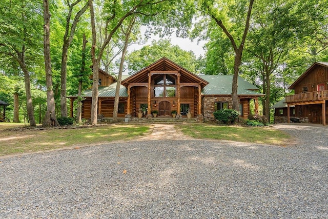 view of log cabin