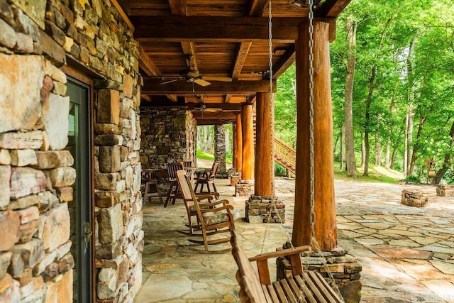 view of patio with ceiling fan