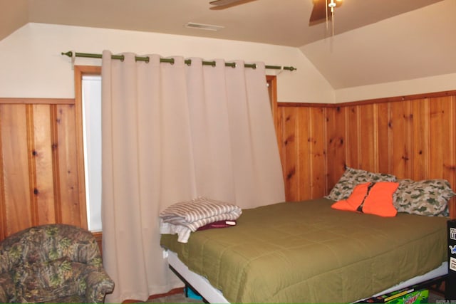 bedroom featuring lofted ceiling and ceiling fan