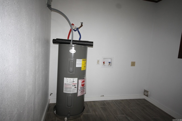 utility room featuring water heater