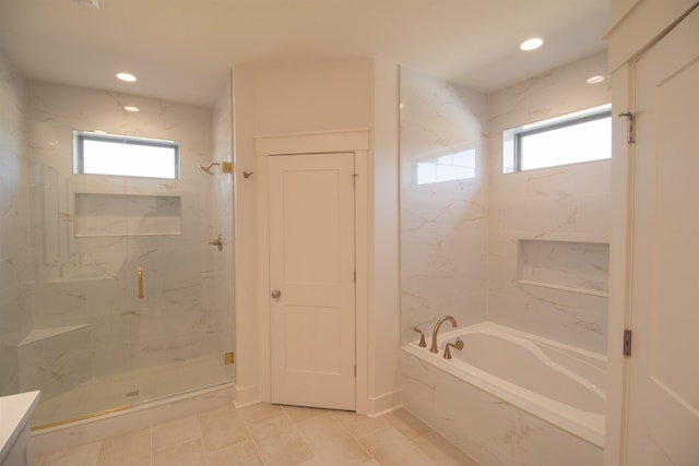 bathroom with plenty of natural light and plus walk in shower