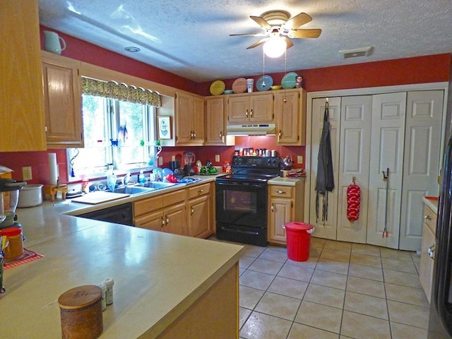 kitchen featuring kitchen peninsula, black range with electric cooktop, a textured ceiling, ceiling fan, and light tile patterned floors