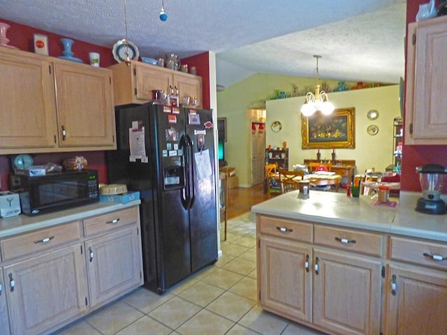 kitchen with black appliances, light brown cabinets, decorative light fixtures, a notable chandelier, and lofted ceiling