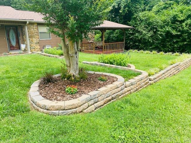 view of yard featuring a deck