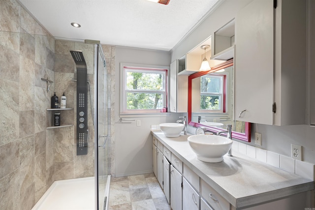 170 Ridge Rd, Houston, AR 72720 - bathroom featuring double vanity, baseboards, a sink, and a stall shower