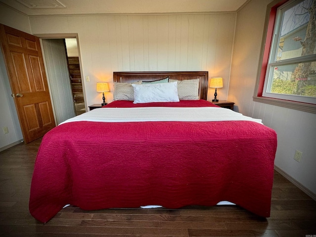 bedroom featuring dark hardwood / wood-style floors