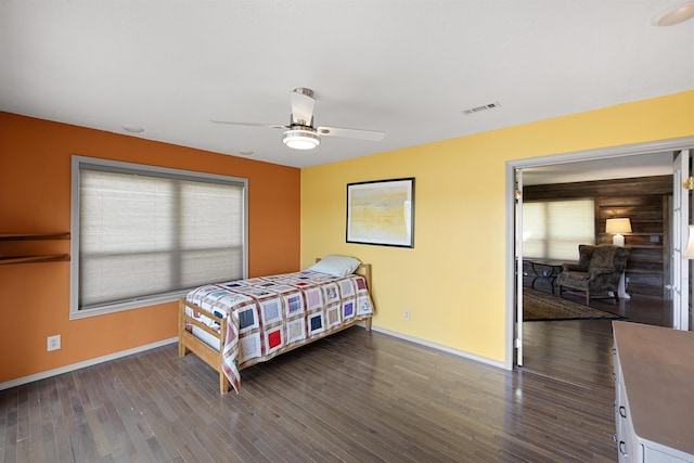 170 Ridge Rd, Houston, AR 72720 - bedroom featuring baseboards, visible vents, dark wood-style floors, and ceiling fan