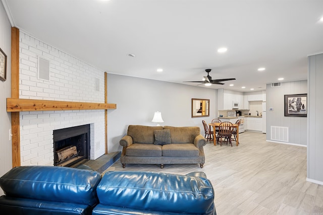170 Ridge Rd, Houston, AR 72720 - living area featuring visible vents, recessed lighting, a brick fireplace, and ceiling fan