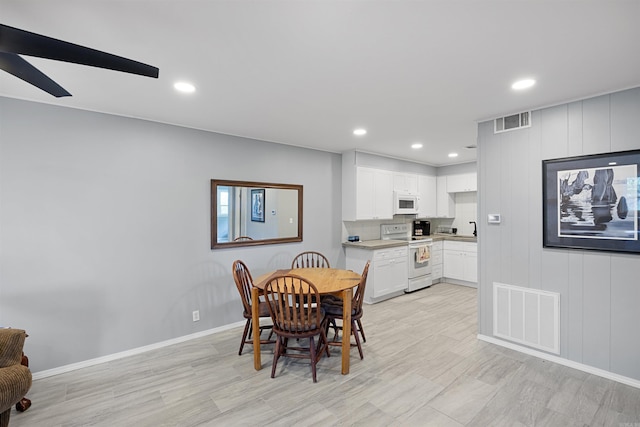 170 Ridge Rd, Houston, AR 72720 - dining room with baseboards, recessed lighting, light wood-style flooring, and visible vents