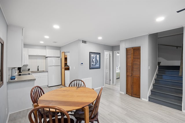 170 Ridge Rd, Houston, AR 72720 - dining room with visible vents, stairs, baseboards, recessed lighting, and light wood-type flooring