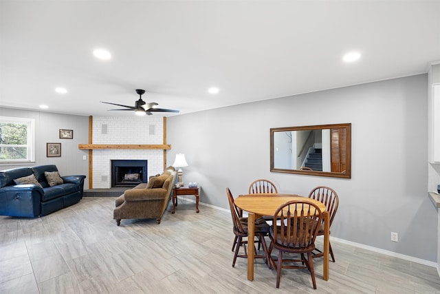 170 Ridge Rd, Houston, AR 72720 - dining area with a ceiling fan, a fireplace, stairway, baseboards, and recessed lighting