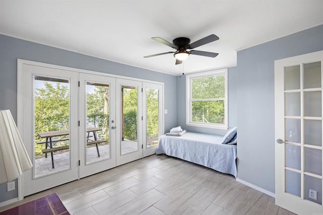 170 Ridge Rd, Houston, AR 72720 - bedroom featuring french doors, a ceiling fan, baseboards, and access to exterior