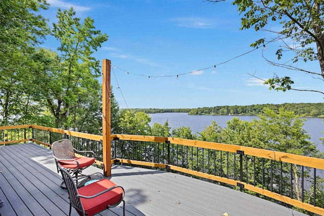 wooden terrace with a water view